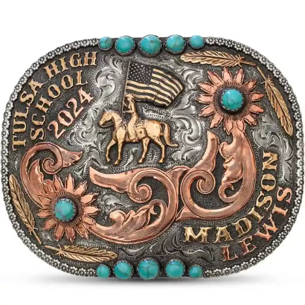 Celebrate in style with the Oklahoma Belt Buckle, an exquisitely antiqued women's buckle adorned with berry beads and vibrant simulated turquoise stones. Finished with Jeweler's Bronze letters, feathers, and a striking rodeo figure!